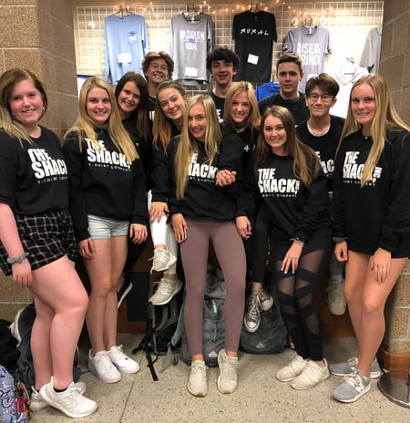 Staff of "The Shack" student run spirit wear store.